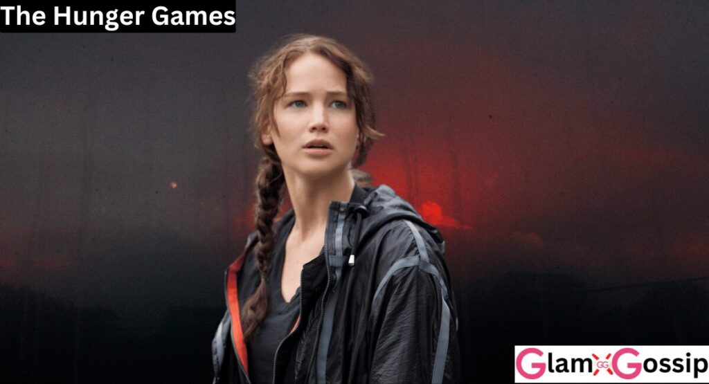 Jennifer Lawrence holding a bow in The Hunger Games