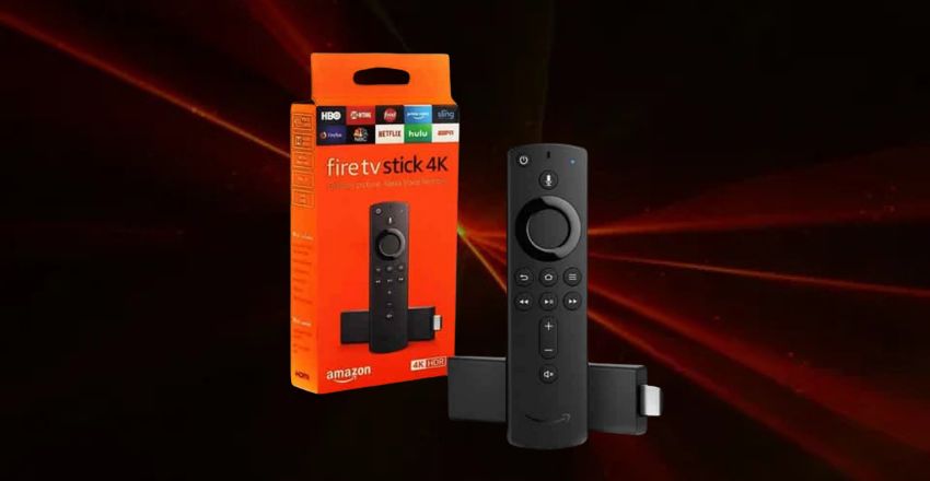 Fire TV Stick streaming device plugged into a television port
