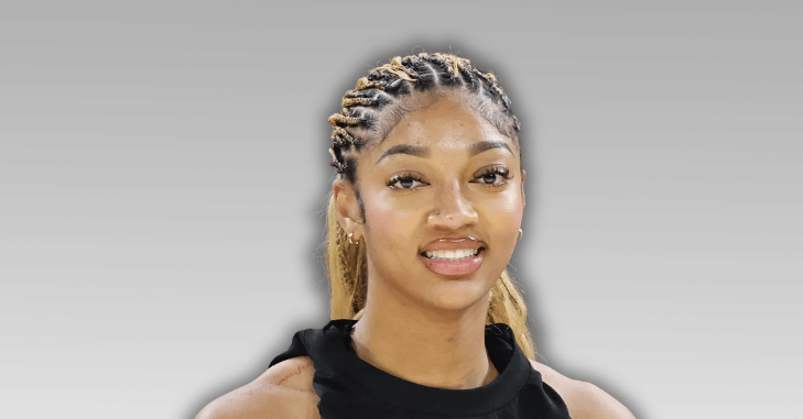 Angel Reese posing for a portrait in team apparel